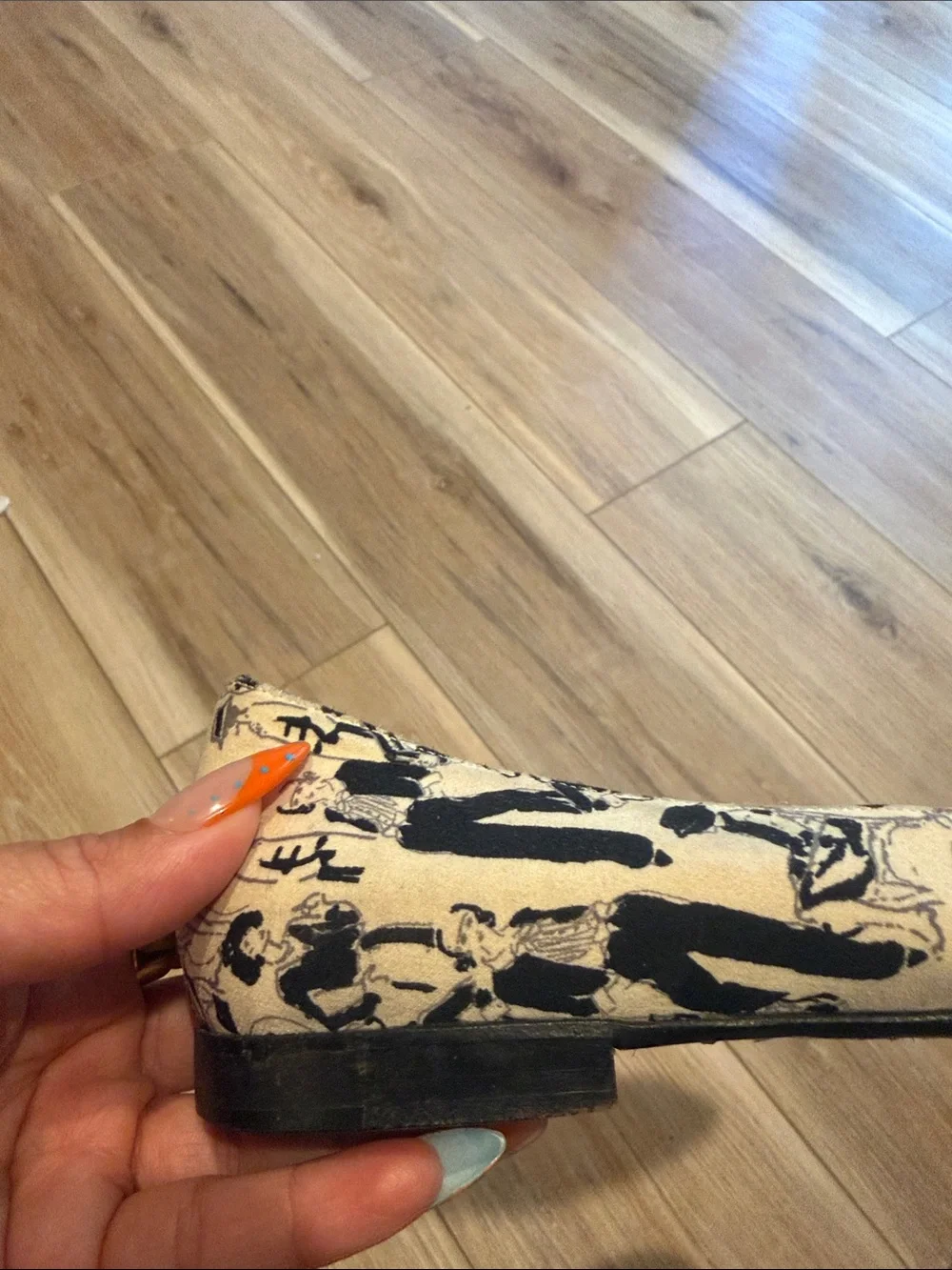 CHANEL Black & White Floral Appliqué Ballet Flats